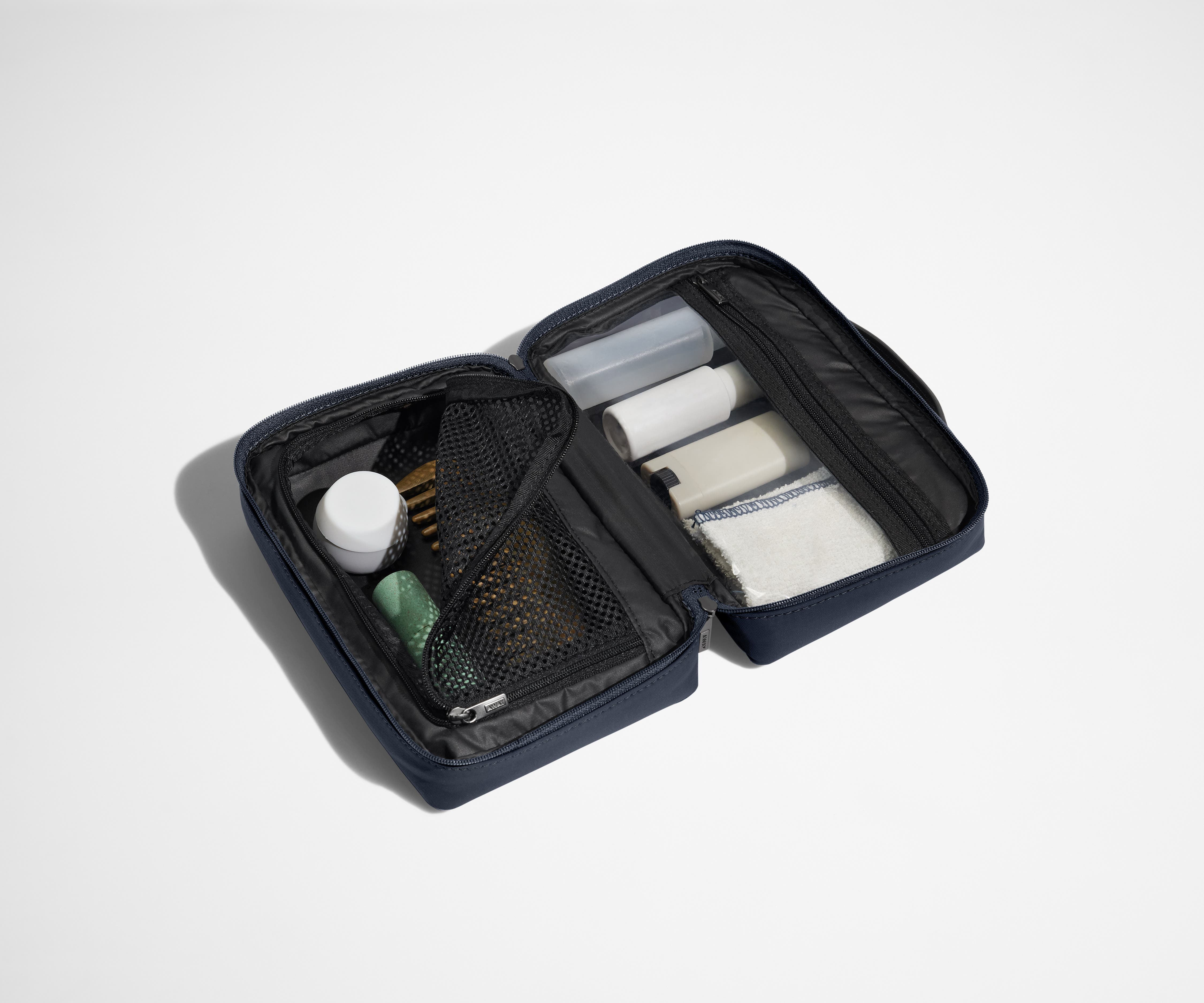 The Small Toiletry Bag in Navy Blue - Image 2