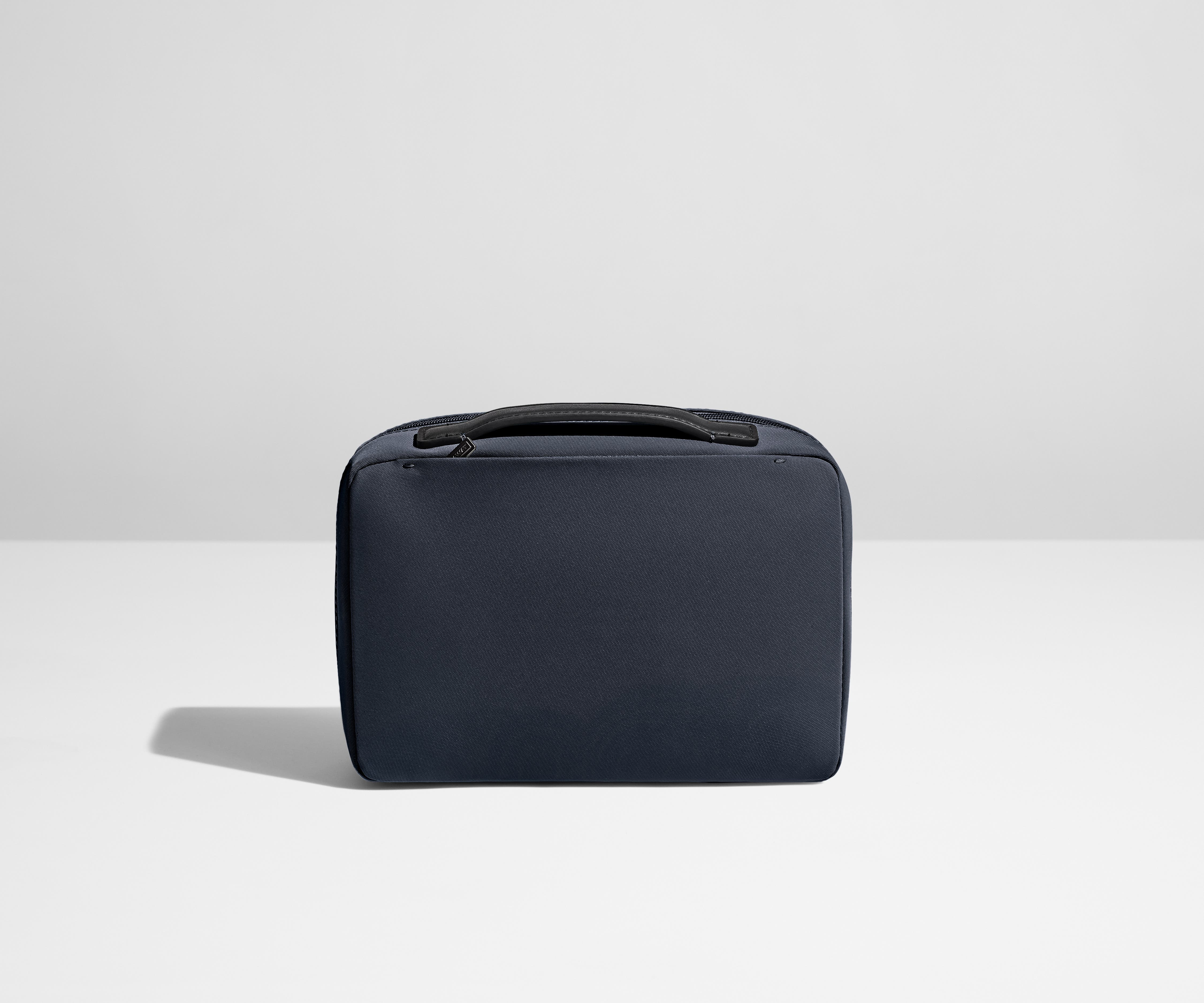 The Small Toiletry Bag in Navy Blue - Image 3